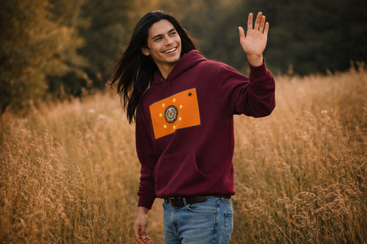 Man walking in flield wearing a Cherokee Native American Tribal Flag Hoodie