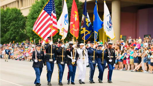 Soldiers carrying 5 US Military flags as well as the US flag at a parade