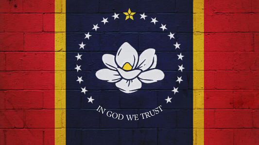 Mississippi state flag painted in brilliant red, white, blue and gold on a wall