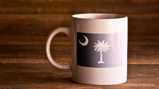 South Carolina flag mug displayed on a wooden table