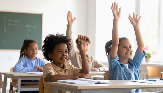 Students Raising Hands in Classroom Setting