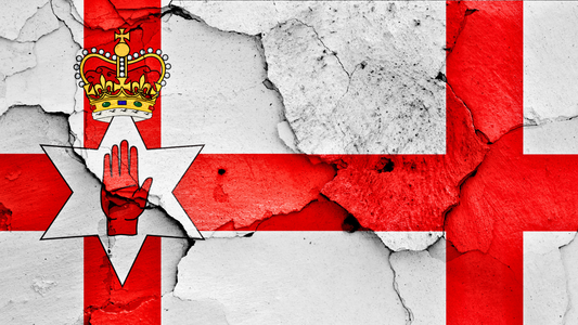 The Red Hand of Ulster Irelands Flag Banner painted on a flaking wall