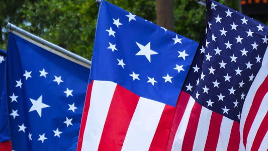 USA historical flags hanging on flagpoles