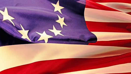 A close-up of the 13 star Betsy Ross US Flag