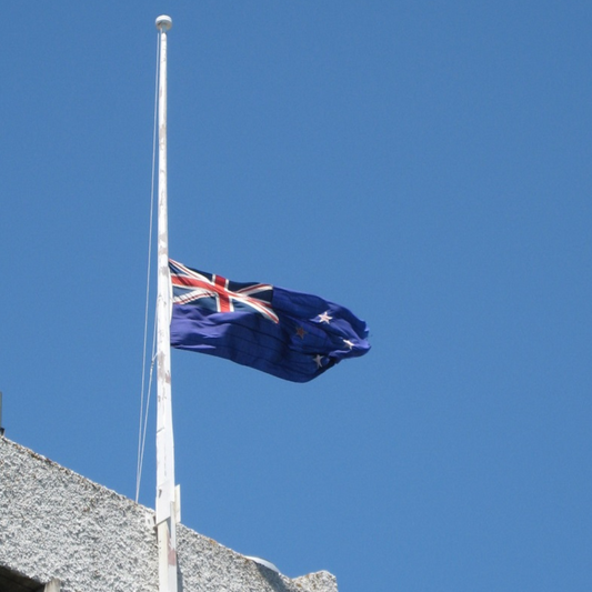 Why are flags flown at half mast